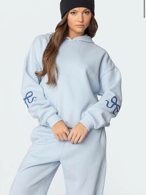 Edikted Pastel Blue Hoodie with Sleeve Script Detail